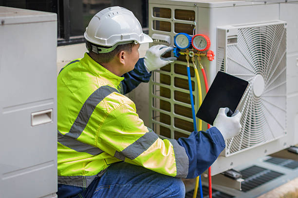 Professional Heat Pump Repair technician working in D'Iberville, MS